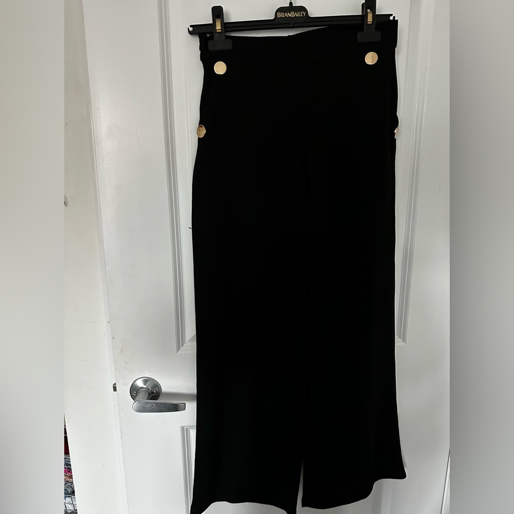 Elegant Black Wide-Leg Pants with Pockets